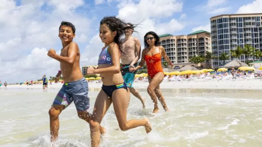 Family Running at the Beach